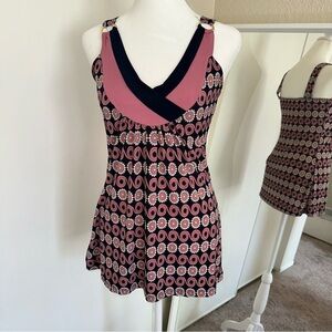 Pink floral babydoll top with ring at the neck size medium